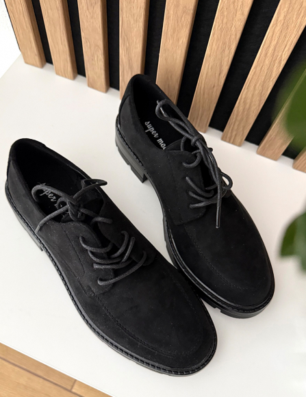 Čierne poltopánky Irana